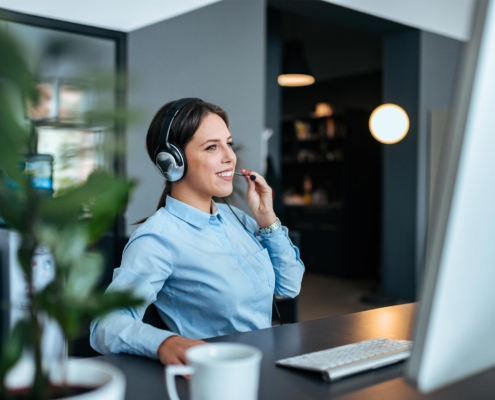 Image of a business person talking on their computer.